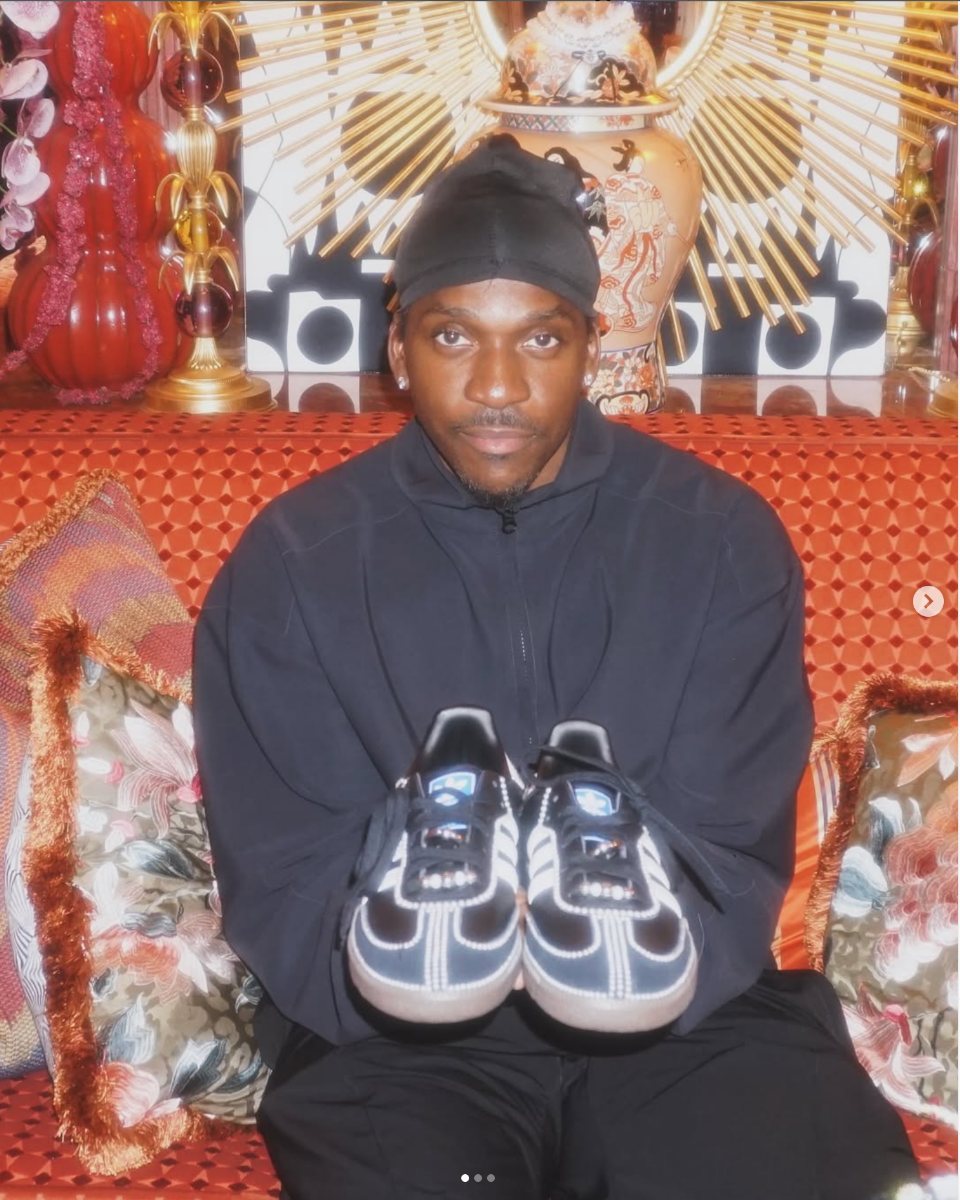 Pusha-T holding customised Sambas